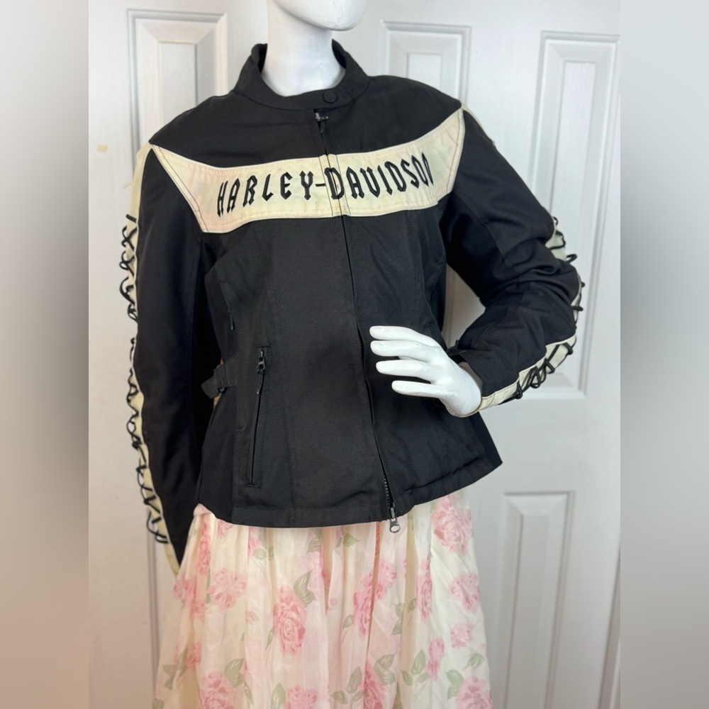 Harley-Davidson Women's Black and Cream Leather Jacket. Size large.